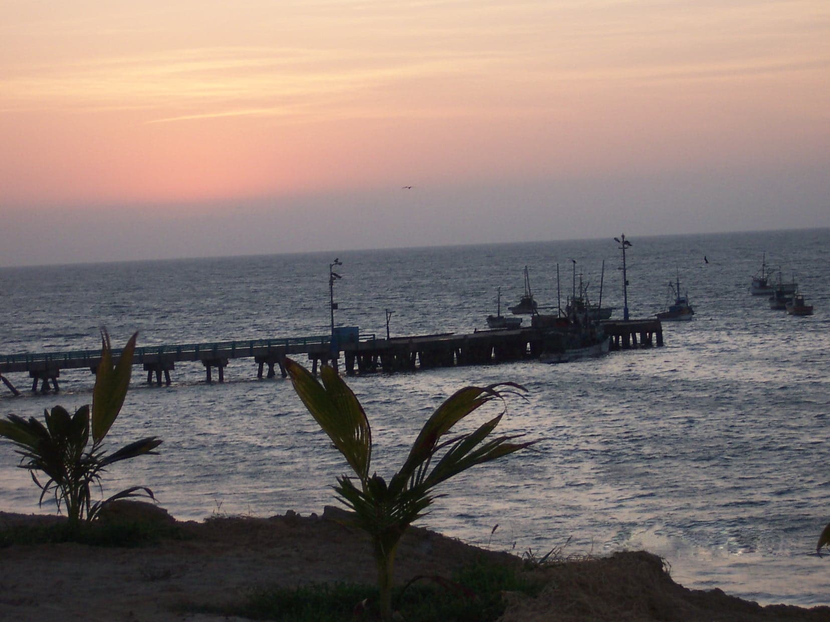 Sunset over the harbor — Máncora, Peru