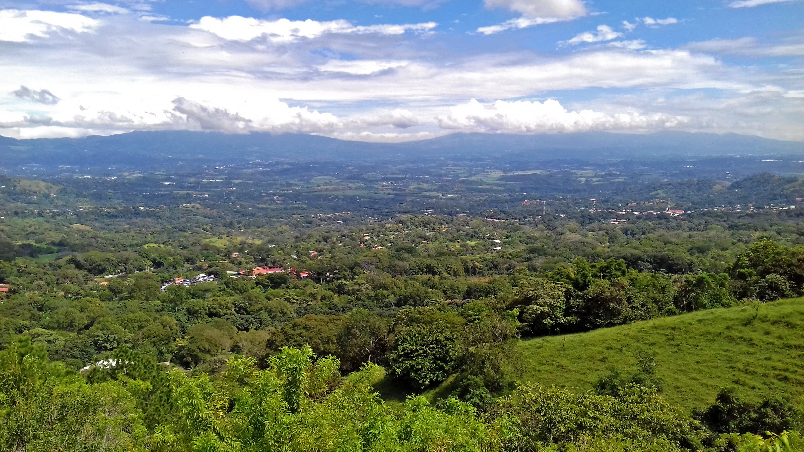 Hillside view over Atenas and the green valley below — Costa Rica