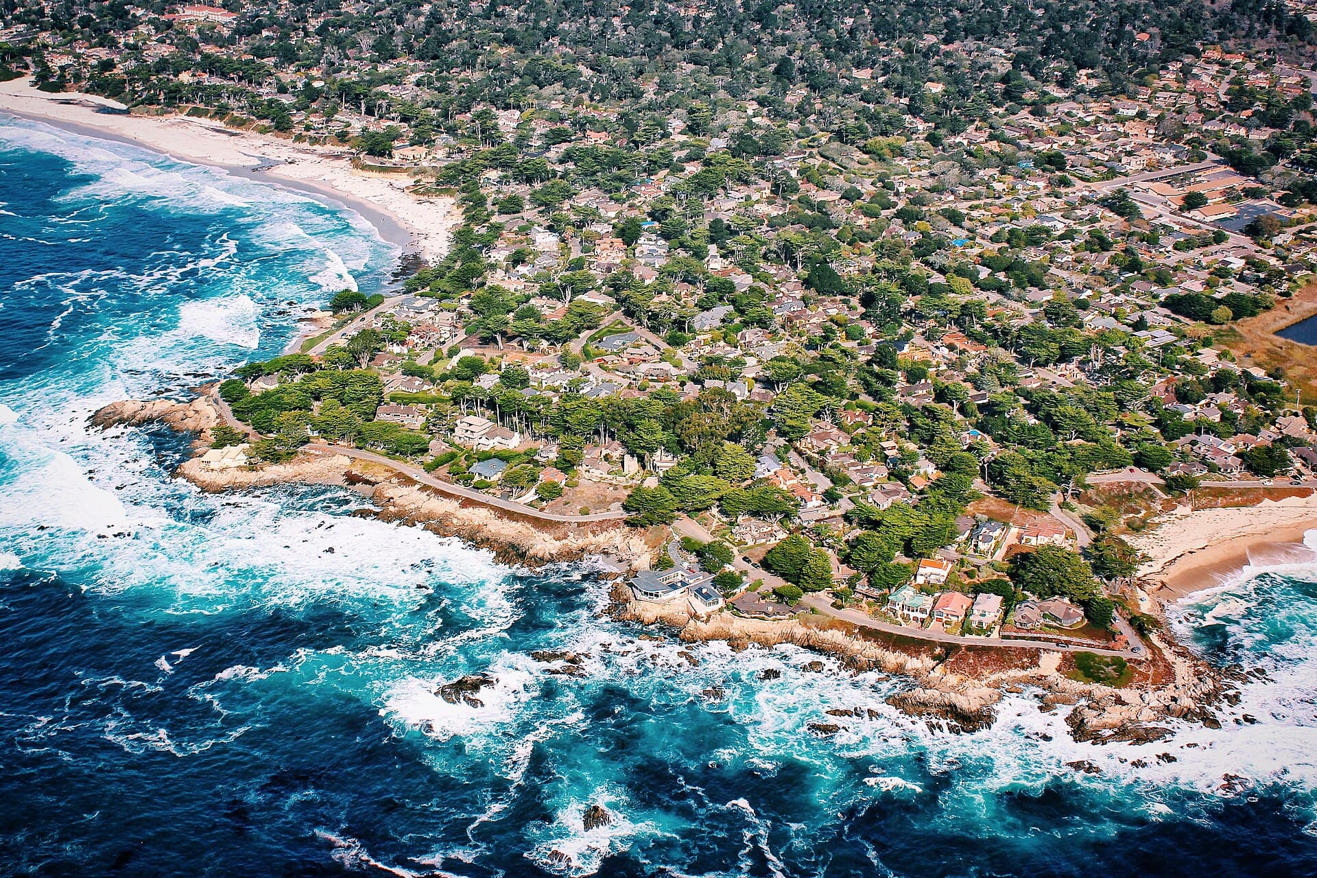 The white-sand cove and cypress coastline — Carmel-by-the-Sea, California