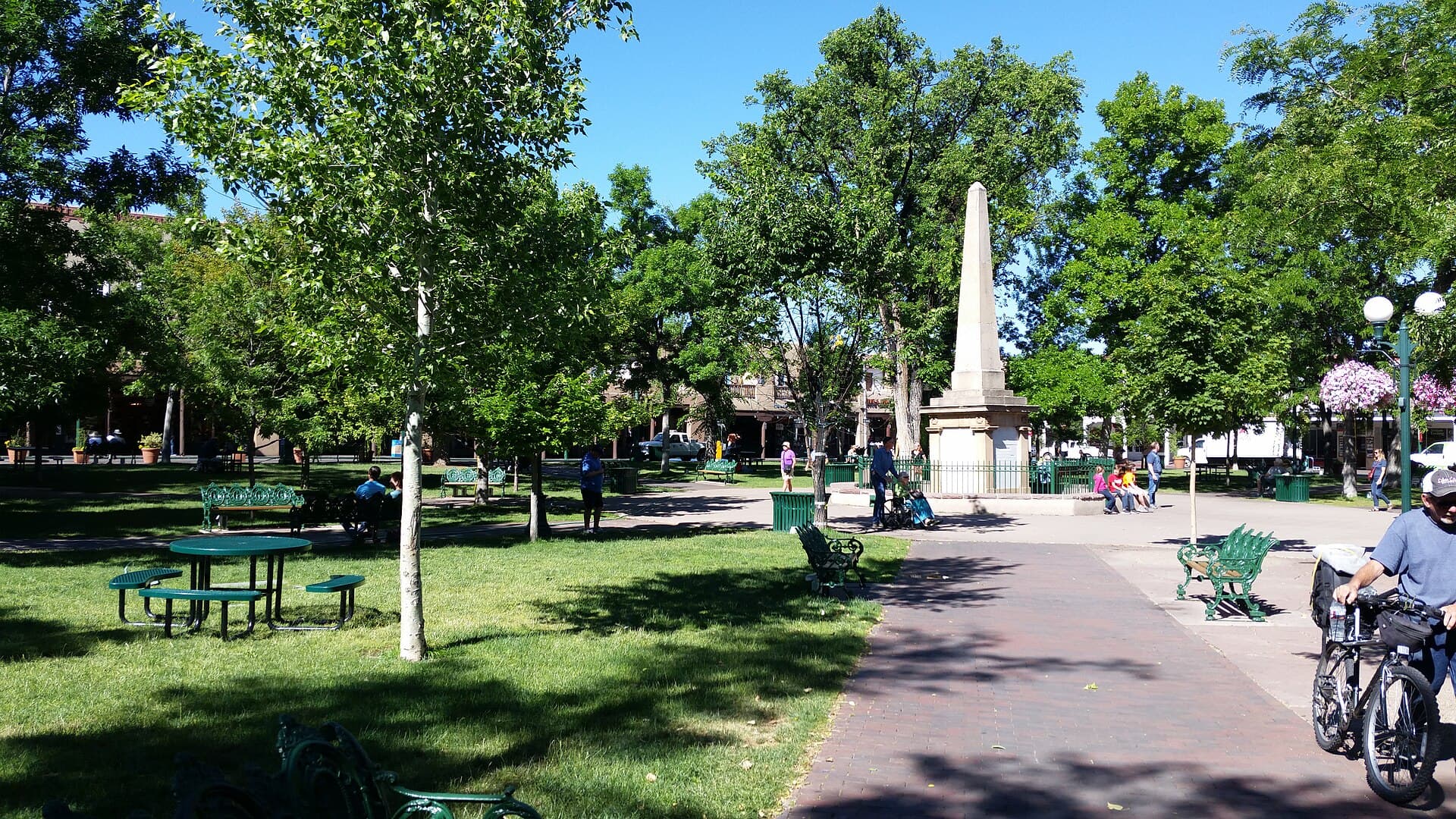 The green Santa Fe Plaza with its obelisk monument — New Mexico